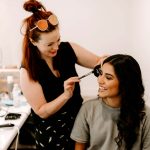 Professional makeup artist preparing a client for a Sydney event